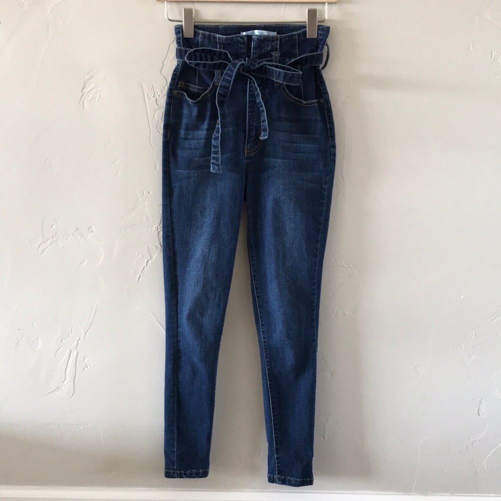 High waisted skinny jeans with bow tie